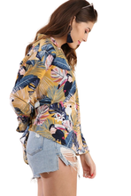 Mango Yellow Tropical Print Collared Button Up Top with Long Bell Sleeves light weight fabric perfect for a summer day. Style tied in the front, as a cover up, or with a pair of shorts. Shop Canary Clothing