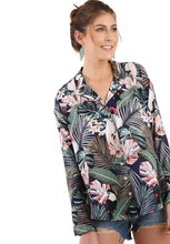 Navy Blue Tropical Print Collared Button Up Top with Long Bell Sleeves light weight fabric perfect for a summer day. Style tied in the front, as a cover up, or with a pair of shorts. Shop Canary Clothing