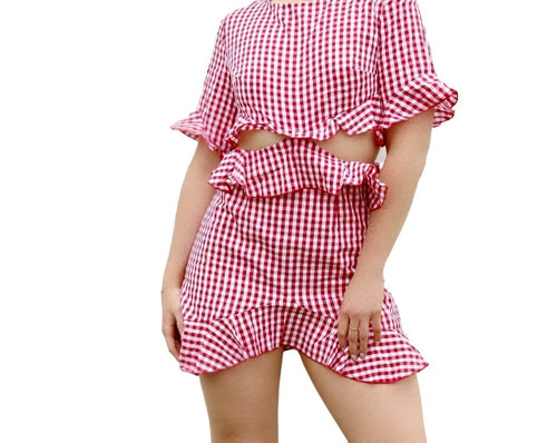 Ready for a picnic with this Red and white gingham dress. Style this with some white sneakers or your favorite wedge sandals -  Shop Canary Clothing