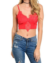 This adjustable strap red lace crop top features a scooped neckline and a cropped fit. - Shop Canary Clothing