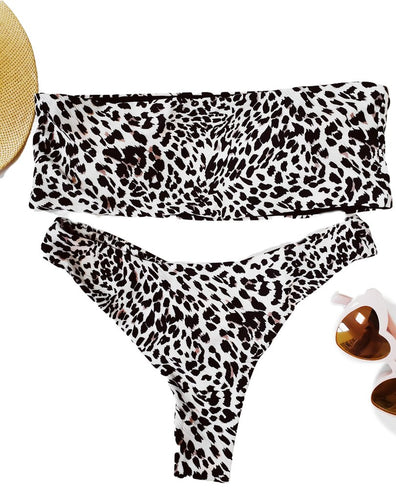 Bandeau Cheetah Print Tube Top Thong Bikini. Features a strapless bandeau top with padded cups. Thong swim bottoms in a high cut leg design - Shop Canary Clothing